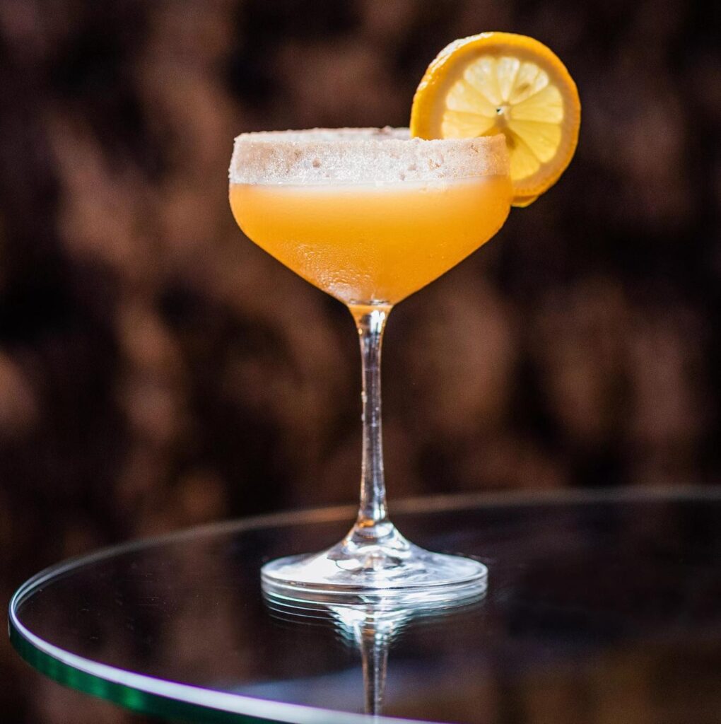 Champagne bar cocktail with orange